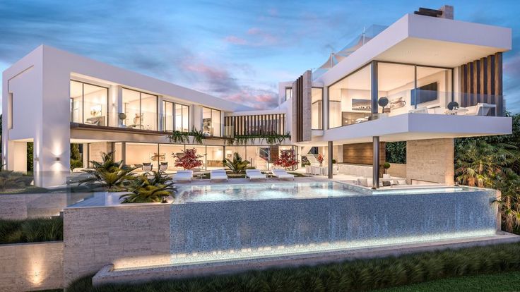 Modern luxury villa Spain with pool at dusk